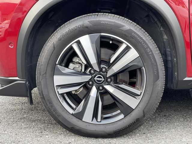 日産 エクストレイル G e－4ORCE 埼玉県 2024(令6)年 1.8万km 赤 ワンオーナー/NISMOエアロパーツ/キャメルレザー/パノラマサンルーフ/プロパイロット/パワーバックドア/パーキングアシスト/純正19インチアルミ/サイドステップ/全席シートヒーター/デジタルルームミラー/純正ナビTV/アラウンドビューモニター/ダウンヒルアシスト/LEDヘッドライト/FRコーナーセンサー/ハンドル支援/ETC/新車保証書/取扱説明書