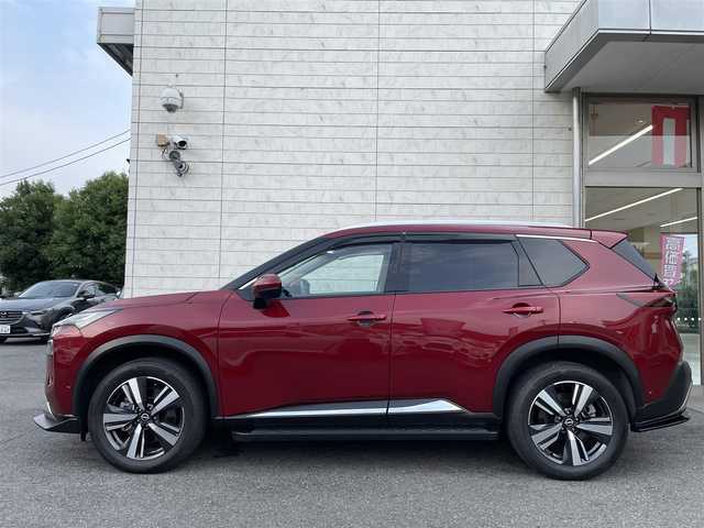 日産 エクストレイル G e－4ORCE 埼玉県 2024(令6)年 1.8万km 赤 ワンオーナー/NISMOエアロパーツ/キャメルレザー/パノラマサンルーフ/プロパイロット/パワーバックドア/パーキングアシスト/純正19インチアルミ/サイドステップ/全席シートヒーター/デジタルルームミラー/純正ナビTV/アラウンドビューモニター/ダウンヒルアシスト/LEDヘッドライト/FRコーナーセンサー/ハンドル支援/ETC/新車保証書/取扱説明書