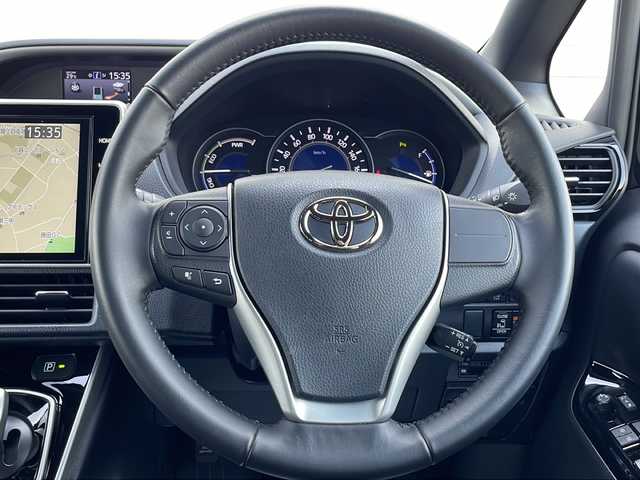 トヨタ ヴォクシー ハイブリッド ZS 煌Ⅲ 茨城県 2021(令3)年 1.2万km ブラック セーフティセンス/純正フリップダウンモニター/純正ナビ/　　CD/DVD/BT/フルセグ/バックカメラ/両側パワースライドドア /クルーズコントロール/LEDオートライト/オートマチックハイビーム/ハーフレザーシート/シートヒーター /純正16インチアルミホイール/クリアランスソナー /ステアリングスイッチ/スマートキー/ETC