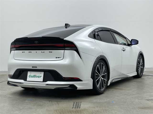 トヨタ プリウス Z 岡山県 2023(令5)年 3.7万km プラチナホワイトパールマイカ モデリスタエアロ /シグネチャーイルミ/パノラマルーフ /パノラミックビューモニター/純正12.3インチディスプレイオーディオ/ナビ/地デジ/Bluetooth/カープレイ/USB/合皮シート/シートヒーター /シートベンチレーション/パワーバックドア /セーフティセンス /レーダークルーズコントロール/LEDヘッドライト/ローダウン/アドバンスドパーク/BSM/ETC2.0/AC100V/デジタルインナーミラー/ステアリングヒーター