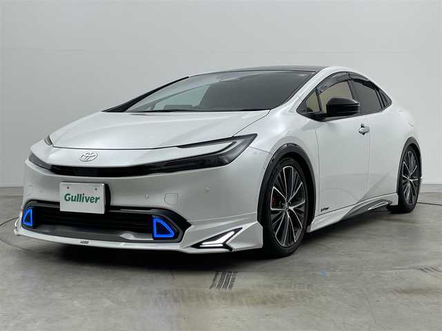トヨタ プリウス Z 岡山県 2023(令5)年 3.7万km プラチナホワイトパールマイカ モデリスタエアロ /シグネチャーイルミ/パノラマルーフ /パノラミックビューモニター/純正12.3インチディスプレイオーディオ/ナビ/地デジ/Bluetooth/カープレイ/USB/合皮シート/シートヒーター /シートベンチレーション/パワーバックドア /セーフティセンス /レーダークルーズコントロール/LEDヘッドライト/ローダウン/アドバンスドパーク/BSM/ETC2.0/AC100V/デジタルインナーミラー/ステアリングヒーター