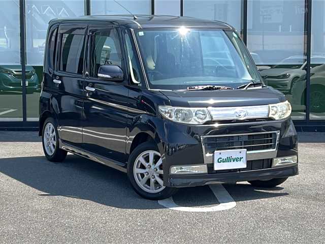 ダイハツ タント カスタム X リミテッド 大分県 2009(平21)年 6.5万km ブラックマイカ 登録時走行距離64317km/７インチＨＤＤナビ　/片側パワースライドドア　/ワンセグＴＶ　/純正アルミホイール　/純正フロアマット　/ウィンカーミラー　/スマートキー　/ドアバイザー　/ハロゲンヘッドライト　/パワーステアリング　/パワーウィンドウ/ＣＤチェンジャー/Wエアバッグ