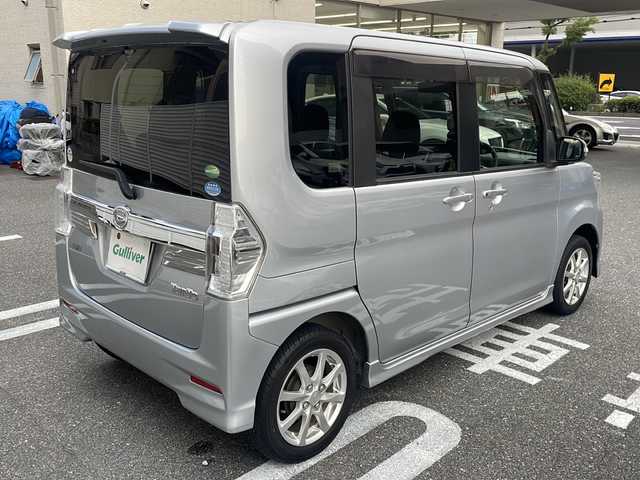 ダイハツ タント カスタム X SA 広島県 2014(平26)年 2.9万km ブライトシルバーメタリック /登録時走行距離/　　　　　　　28130キロ/社外ナビ/バックカメラ/地デジ/左後パワースライドドア/オートライト/ETC/新車時整備手帳/　　【保証書】/取扱説明書/