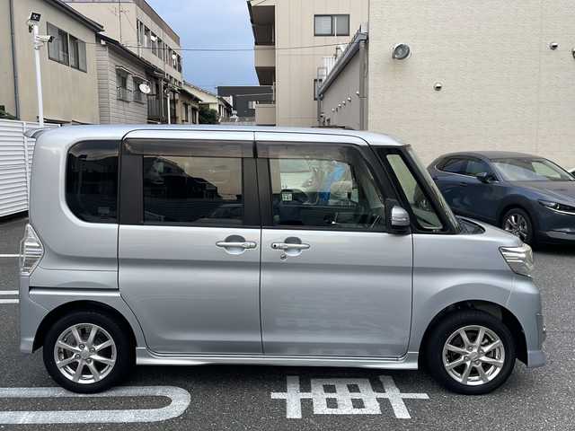 ダイハツ タント カスタム X SA 広島県 2014(平26)年 2.9万km ブライトシルバーメタリック /登録時走行距離/　　　　　　　28130キロ/社外ナビ/バックカメラ/地デジ/左後パワースライドドア/オートライト/ETC/新車時整備手帳/　　【保証書】/取扱説明書/