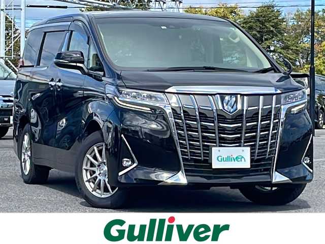 トヨタ アルファードハイブリット G Fパッケージ 道央・札幌 2022(令4)年 3.7万km ブラック ４WD/純正メーカーナビ/CD/DVD/BT/フルセグ/純正フリップダウンモニター/トヨタセーフティセンス/プリクラッシュセーフティ/横滑り防止装置/レーダークルーズコントロール/レーンキープアシスト/クリアランスソナー/ブラインドスポットモニター/パーキングブレーキサポート/リアクロストラフィックアラート/ロードサインアシスト/バックカメラ/ビルトインETC2.0/ドライブレコーダー/EVMODE/ECOMODE/両側パワースライドドア/パワーバックドア/前席/２列目パワーシート/D席メモリーシート/前席シートヒーター/前席エアシート/N席/２列目オットマン/レザーシート/革巻きウッドコンビステアリング/ステアリングリモコン/ハンドルヒーター/AC100V/電動パーキング/ブレーキホールド/デジタルインナーミラー/MTモード付AT/プッシュスタート/スマートキー/LEDヘッドライト/オートライト/オートハイビーム/フォグランプ/電動格納ミラー/ウィンカーミラー/純正フロアマット/ドアバイザー/スペアキー