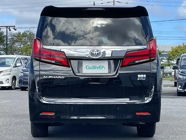 トヨタ アルファードハイブリット G Fパッケージ 道央・札幌 2022(令4)年 3.7万km ブラック ４WD/純正メーカーナビ/CD/DVD/BT/フルセグ/純正フリップダウンモニター/トヨタセーフティセンス/プリクラッシュセーフティ/横滑り防止装置/レーダークルーズコントロール/レーンキープアシスト/クリアランスソナー/ブラインドスポットモニター/パーキングブレーキサポート/リアクロストラフィックアラート/ロードサインアシスト/バックカメラ/ビルトインETC2.0/ドライブレコーダー/EVMODE/ECOMODE/両側パワースライドドア/パワーバックドア/前席/２列目パワーシート/D席メモリーシート/前席シートヒーター/前席エアシート/N席/２列目オットマン/レザーシート/革巻きウッドコンビステアリング/ステアリングリモコン/ハンドルヒーター/AC100V/電動パーキング/ブレーキホールド/デジタルインナーミラー/MTモード付AT/プッシュスタート/スマートキー/LEDヘッドライト/オートライト/オートハイビーム/フォグランプ/電動格納ミラー/ウィンカーミラー/純正フロアマット/ドアバイザー/スペアキー