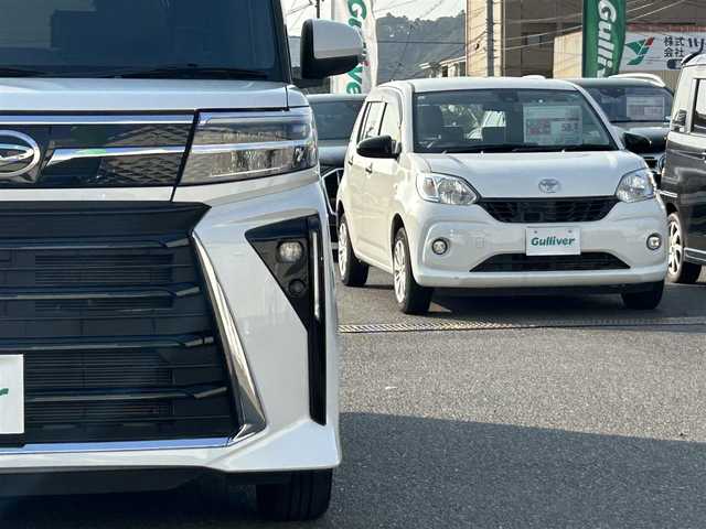 ダイハツ タント カスタム X 広島県 2023(令5)年 2.1万km シャイニングホワイトパール 純正9インチディスプレイオーディオ/　【フルセグTV/BT/USB/HDMI/AppleCarPlay】/バックカメラ/スマートアシスト/・衝突被害軽減ブレーキ/・車線逸脱抑制機能/・車線逸脱警報/・車線逸脱制御/・標識認識機能/・ふらつき警報機能/両側パワースライドドア/ハーフレザーシート/前席シートヒーター/クリアランスソナー/ETC/ドライブレコーダー/オートホールド/オートリトラミラー/オートライト/純正LEDライト/フォグランプ/スマートキー/プッシュスタート/アイドリングストップ/純正アルミホイール 14インチ/純正ドアバイザー/ロールサンシェード/ウインカーミラー/純正フロアマット/リアプライバシーガラス/スペアキー×1【スマートキー】/取扱説明書