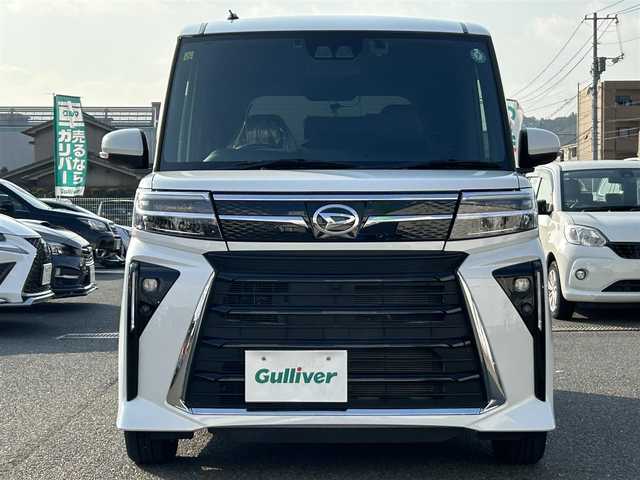 ダイハツ タント カスタム X 広島県 2023(令5)年 2.1万km シャイニングホワイトパール 純正9インチディスプレイオーディオ/　【フルセグTV/BT/USB/HDMI/AppleCarPlay】/バックカメラ/スマートアシスト/・衝突被害軽減ブレーキ/・車線逸脱抑制機能/・車線逸脱警報/・車線逸脱制御/・標識認識機能/・ふらつき警報機能/両側パワースライドドア/ハーフレザーシート/前席シートヒーター/クリアランスソナー/ETC/ドライブレコーダー/オートホールド/オートリトラミラー/オートライト/純正LEDライト/フォグランプ/スマートキー/プッシュスタート/アイドリングストップ/純正アルミホイール 14インチ/純正ドアバイザー/ロールサンシェード/ウインカーミラー/純正フロアマット/リアプライバシーガラス/スペアキー×1【スマートキー】/取扱説明書