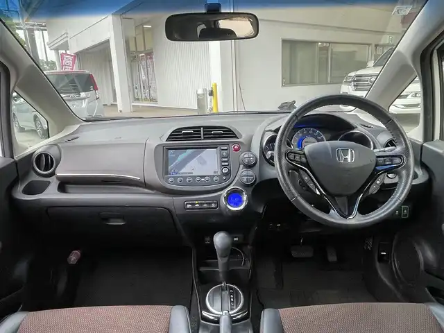 ホンダ フィット シャトル ハイブリッド スマートセレ 千葉県 2012(平24)年 6.9万km プレミアムホワイトパール 純正HDDナビ/・ワンセグTV/・CD/DVD/・AM/FM/バックカメラ/クルーズコントロール/ビルトインETC/横滑り防止装置/ECON/オートライト/HIDヘッドライト/フォグライト /ステアリングスイッチ/スマートキーx２/純正フロアマット