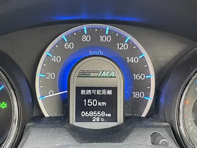 ホンダ フィット シャトル ハイブリッド スマートセレ 千葉県 2012(平24)年 6.9万km プレミアムホワイトパール 純正HDDナビ/・ワンセグTV/・CD/DVD/・AM/FM/バックカメラ/クルーズコントロール/ビルトインETC/横滑り防止装置/ECON/オートライト/HIDヘッドライト/フォグライト /ステアリングスイッチ/スマートキーx２/純正フロアマット