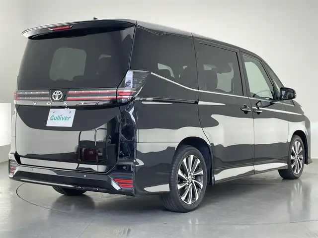 トヨタ ヴォクシー S－Z 愛知県 2022(令4)年 3.6万km アティチュードブラックマイカ 純正１０．５型ナビＴＶ　純正１４型後席モニター　禁煙　快適利便Ｈｉｇｈ　シートヒーター　デジタルインナミラー　パワーバックドア　オットマン　バックカメラ　衝突軽減　追従クルコン　ＨＤＭＩ　ハーフレザー　セーフティセンス　HUD　コーナーセンサー　LEDオートライト