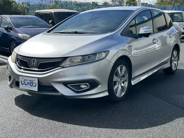 ホンダ ジェイド ハイブリッド X 東京都 2017(平29)年 8.8万km スーパープラチナメタリック (株)IDOMが運営する【じしゃロン昭島店】の自社ローン専用車両になります。こちらは現金またはオートローンご利用時の価格です。自社ローンご希望の方は別途その旨お申付け下さい/純正インターナビ/バックカメラ/ドライブレコーダー/ホンダセンシング/ハーフレザーシート/LEDライト/電動格納ミラー/純正フロアマット