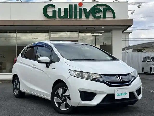 ホンダ フィット ハイブリット Lパッケージ 三重県 2015(平27)年 13.3万km ホワイトオーキッドパール ワンオーナー/♪シティブレーキアクティブシステム/♪誤発進抑制機能/♪純正ナビ/・フルセグ/・Bluetooth ・CD再生/・DVD再生/録音機能/♪バックカメラ/♪クルーズコントロール/♪ハーフレザーシート/♪LEDヘッドライト/♪オートライト/♪ステアリングスイッチ/♪オートリトラクタブルミラー/♪ウィンカーミラー/♪ビルトインETC/♪ドライブレコーダー