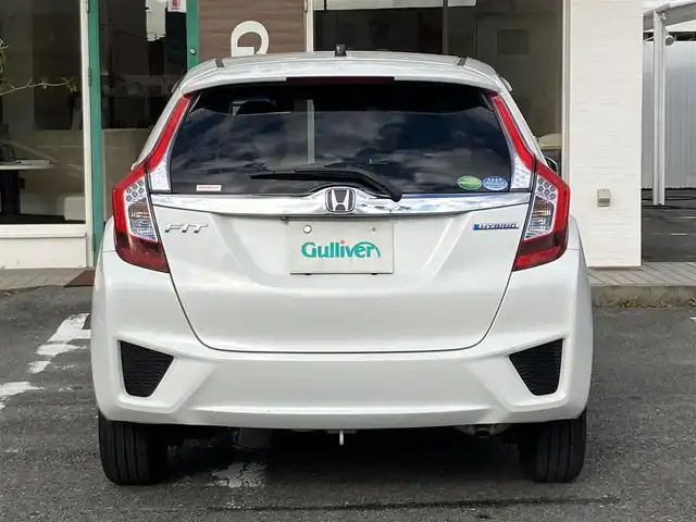 ホンダ フィット ハイブリット Lパッケージ 三重県 2015(平27)年 13.3万km ホワイトオーキッドパール ワンオーナー/♪シティブレーキアクティブシステム/♪誤発進抑制機能/♪純正ナビ/・フルセグ/・Bluetooth ・CD再生/・DVD再生/録音機能/♪バックカメラ/♪クルーズコントロール/♪ハーフレザーシート/♪LEDヘッドライト/♪オートライト/♪ステアリングスイッチ/♪オートリトラクタブルミラー/♪ウィンカーミラー/♪ビルトインETC/♪ドライブレコーダー