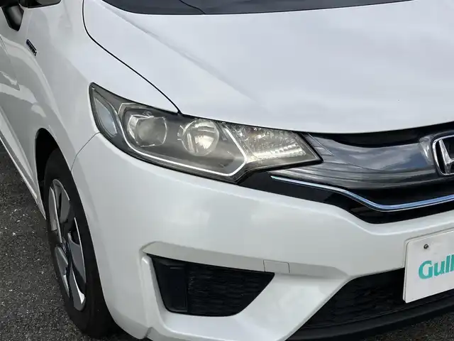 ホンダ フィット ハイブリット Lパッケージ 三重県 2015(平27)年 13.3万km ホワイトオーキッドパール ワンオーナー/♪シティブレーキアクティブシステム/♪誤発進抑制機能/♪純正ナビ/・フルセグ/・Bluetooth ・CD再生/・DVD再生/録音機能/♪バックカメラ/♪クルーズコントロール/♪ハーフレザーシート/♪LEDヘッドライト/♪オートライト/♪ステアリングスイッチ/♪オートリトラクタブルミラー/♪ウィンカーミラー/♪ビルトインETC/♪ドライブレコーダー