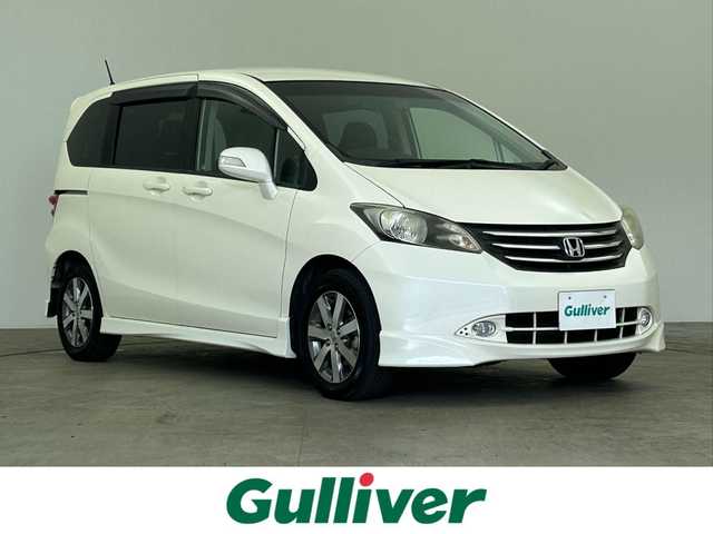 ホンダ フリード Gエアロ ジャストセレクション 千葉県 2009(平21)年 9.3万km プレミアムホワイトパール 禁煙車/社外メモリナビ/　CD/DVD/BT/フルセグTV/片側パワースライドドア/バックカメラ/リモコンキー/電動格納ミラー/純正フロアマット/純正15インチアルミホイール