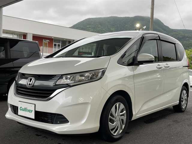 ホンダ フリード G 長崎県 2018(平30)年 6.4万km ホワイトオーキッドパール ワンオーナー/純正ナビ（フルセグ/CD/DVD/AM/FM/」BTオーディオ）/プッシュスタート/ステアリングリモコン/両側パワスラ/バックカメラ/電格ミラー/ドアバイザー/純正フロアマット/ビルトインETC/木目調インパネ/SRSエアバッグ/ビークルスタビリティアシスト/車線維持支援システム