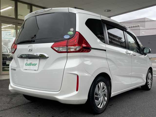 ホンダ フリード G 長崎県 2018(平30)年 6.4万km ホワイトオーキッドパール ワンオーナー/純正ナビ（フルセグ/CD/DVD/AM/FM/」BTオーディオ）/プッシュスタート/ステアリングリモコン/両側パワスラ/バックカメラ/電格ミラー/ドアバイザー/純正フロアマット/ビルトインETC/木目調インパネ/SRSエアバッグ/ビークルスタビリティアシスト/車線維持支援システム