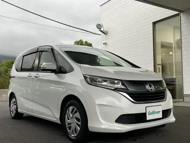ホンダ フリード G 長崎県 2018(平30)年 6.4万km ホワイトオーキッドパール ワンオーナー/純正ナビ（フルセグ/CD/DVD/AM/FM/」BTオーディオ）/プッシュスタート/ステアリングリモコン/両側パワスラ/バックカメラ/電格ミラー/ドアバイザー/純正フロアマット/ビルトインETC/木目調インパネ/SRSエアバッグ/ビークルスタビリティアシスト/車線維持支援システム