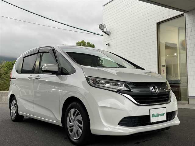 ホンダ フリード G 愛知県 2018(平30)年 6.4万km ホワイトオーキッドパール ワンオーナー/純正ナビ（フルセグ/CD/DVD/AM/FM/」BTオーディオ）/プッシュスタート/ステアリングリモコン/両側パワスラ/バックカメラ/電格ミラー/ドアバイザー/純正フロアマット/ビルトインETC/木目調インパネ/SRSエアバッグ/ビークルスタビリティアシスト/車線維持支援システム