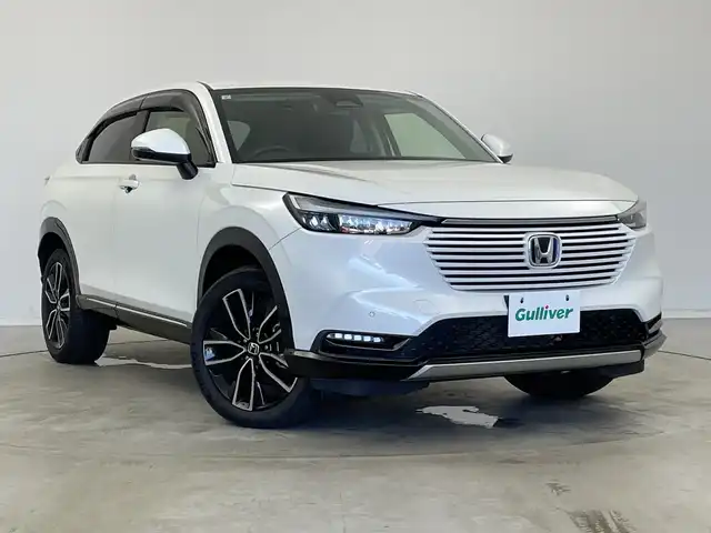 ホンダ ヴェゼル ハイブリッド e:HEV Z 新潟県 2021(令3)年 5.5万km プラチナホワイトパール 純正ナビ/バックカメラ/フルセグTV/ホンダセンシング/ミラーヒーター/イパーデアイサー/ブラインドスポットインフォメーション/ステアリングヒーター/ETC2.0/ハンズフリーアクセスパワーテールゲート（予約クローズ機能付）/オートライト/オートハイビーム/LEDヘッドライト/ブレーキホールド/パドルシフト/スポーツモード/エコモード/D席、N席シートヒーター/ダウンヒルアシストコントロール/本革巻きステアリング