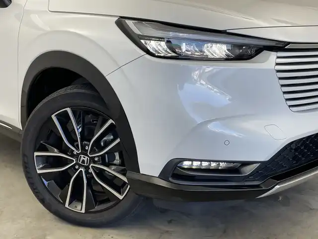 ホンダ ヴェゼル ハイブリッド e:HEV Z 新潟県 2021(令3)年 5.5万km プラチナホワイトパール 純正ナビ/バックカメラ/フルセグTV/ホンダセンシング/ミラーヒーター/イパーデアイサー/ブラインドスポットインフォメーション/ステアリングヒーター/ETC2.0/ハンズフリーアクセスパワーテールゲート（予約クローズ機能付）/オートライト/オートハイビーム/LEDヘッドライト/ブレーキホールド/パドルシフト/スポーツモード/エコモード/D席、N席シートヒーター/ダウンヒルアシストコントロール/本革巻きステアリング