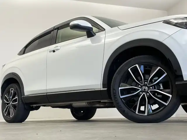 ホンダ ヴェゼル ハイブリッド e:HEV Z 新潟県 2021(令3)年 5.5万km プラチナホワイトパール 純正ナビ/バックカメラ/フルセグTV/ホンダセンシング/ミラーヒーター/イパーデアイサー/ブラインドスポットインフォメーション/ステアリングヒーター/ETC2.0/ハンズフリーアクセスパワーテールゲート（予約クローズ機能付）/オートライト/オートハイビーム/LEDヘッドライト/ブレーキホールド/パドルシフト/スポーツモード/エコモード/D席、N席シートヒーター/ダウンヒルアシストコントロール/本革巻きステアリング
