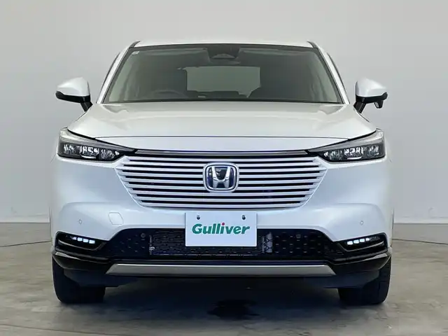ホンダ ヴェゼル ハイブリッド e:HEV Z 新潟県 2021(令3)年 5.5万km プラチナホワイトパール 純正ナビ/バックカメラ/フルセグTV/ホンダセンシング/ミラーヒーター/イパーデアイサー/ブラインドスポットインフォメーション/ステアリングヒーター/ETC2.0/ハンズフリーアクセスパワーテールゲート（予約クローズ機能付）/オートライト/オートハイビーム/LEDヘッドライト/ブレーキホールド/パドルシフト/スポーツモード/エコモード/D席、N席シートヒーター/ダウンヒルアシストコントロール/本革巻きステアリング