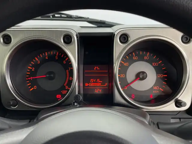 スズキ ジムニー XL 鹿児島県 2020(令2)年 1.6万km ブルーイッシュブラックパール3 ・純正ナビ/（フルセグTV/Bluetooth/CD/DVD/SD)/AVIC-RLS901II/・前席シートヒーター/・電動格納ミラー/・前方ドライブレコーダー/・革ステアリング/・ISOFIX/・リアプライバシーウィンドウ/・ETC/・スマートキー/・プッシュスタート/・純正16インチホイール/・純正ラバーフロアマット/・W＋Sエアバッグ/ABS/・カーテンエアバッグ/・横滑り防止装置/・ブレーキアシスト/・取扱説明書/・保証書/・社外マフラー
