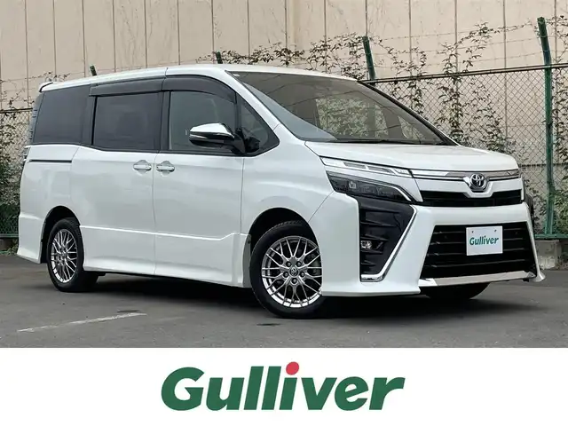 トヨタ ヴォクシー ハイブリッド ZS 煌Ⅱ 東京都 2020(令2)年 5.9万km ホワイトパールクリスタルシャイン アルパインナビ　/アルパイン後席モニター　/両側電動ドア　/シートヒーター　/ビルトインＥＴＣ　/前後ドラレコ　/クルーズコントロール　/フルセグＴＶ　/Ｂｌｕｅｔｏｏｔｈ　/ＬＥＤヘッド　/衝突被害　/レーンキープ