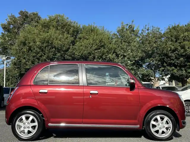 ダイハツ ミラ ジーノ プレミアムX 東京都 2008(平20)年 8.8万km ルージュレッドクリスタルメタリック フロントフォグランプ/MOMO製本木製ステアリングホイール/木目調シフトノブ/タン革/スエード調ファブリックコンビシート/carrozzeriaオーディオ（MVH-5600）/・Bluetoothオーディオ/AUX/FM/AM/ETC/取扱説明書/保証書