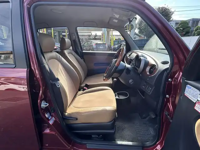 ダイハツ ミラ ジーノ プレミアムX 東京都 2008(平20)年 8.8万km ルージュレッドクリスタルメタリック フロントフォグランプ/MOMO製本木製ステアリングホイール/木目調シフトノブ/タン革/スエード調ファブリックコンビシート/carrozzeriaオーディオ（MVH-5600）/・Bluetoothオーディオ/AUX/FM/AM/ETC/取扱説明書/保証書