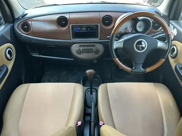 ダイハツ ミラ ジーノ プレミアムX 東京都 2008(平20)年 8.8万km ルージュレッドクリスタルメタリック フロントフォグランプ/MOMO製本木製ステアリングホイール/木目調シフトノブ/タン革/スエード調ファブリックコンビシート/carrozzeriaオーディオ（MVH-5600）/・Bluetoothオーディオ/AUX/FM/AM/ETC/取扱説明書/保証書