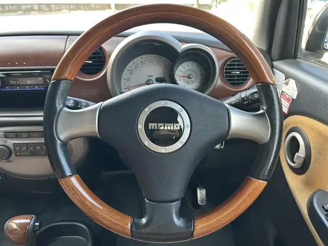ダイハツ ミラ ジーノ プレミアムX 東京都 2008(平20)年 8.8万km ルージュレッドクリスタルメタリック フロントフォグランプ/MOMO製本木製ステアリングホイール/木目調シフトノブ/タン革/スエード調ファブリックコンビシート/carrozzeriaオーディオ（MVH-5600）/・Bluetoothオーディオ/AUX/FM/AM/ETC/取扱説明書/保証書