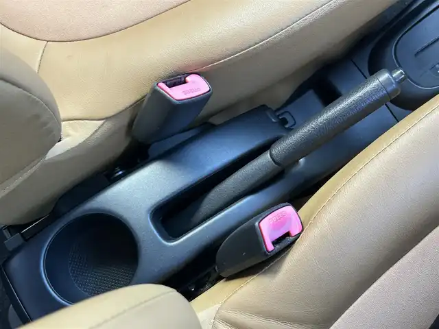 ダイハツ ミラ ジーノ プレミアムX 東京都 2008(平20)年 8.8万km ルージュレッドクリスタルメタリック フロントフォグランプ/MOMO製本木製ステアリングホイール/木目調シフトノブ/タン革/スエード調ファブリックコンビシート/carrozzeriaオーディオ（MVH-5600）/・Bluetoothオーディオ/AUX/FM/AM/ETC/取扱説明書/保証書