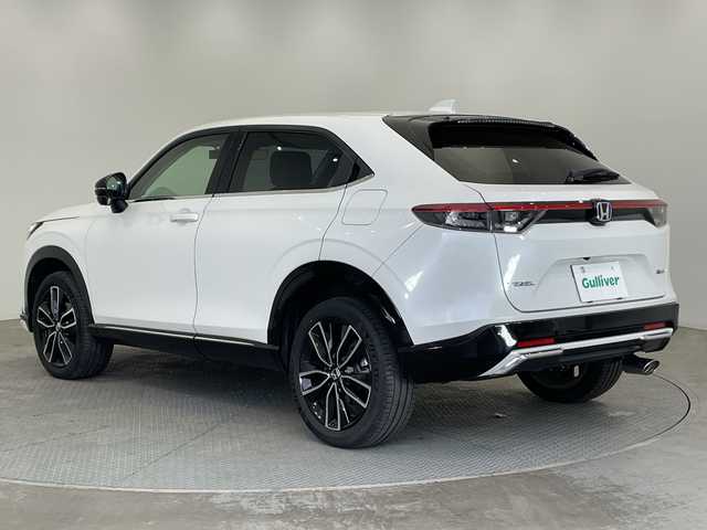 ホンダ ヴェゼル ハイブリッド e:HEV Z 栃木県 2021(令3)年 3.8万km プラチナホワイトパール 純正ナビ/(ワンセグTV/Bluetooth/SD/USB)/Honda SENSING/全方位カメラ/ETC2.0車載器/純正アルミホイール/ドライブレコーダー/禁煙車/ワイヤレス充電器/寒冷地仕様/運転席助手席シートヒーター/ハンズフリーアクセスパワーテールゲート/LEDシーケンシャルターンシグナルランプ/マルチビューカメラシステム/プレミアムオーディオ/コーナーセンサー/衝突軽減システム/横滑り防止装置/ダウンヒルアシストコントロール/スマートキー/プッシュスタート