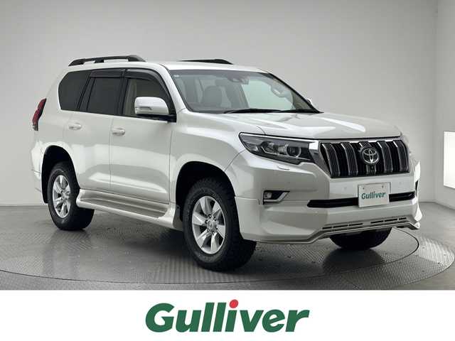 トヨタ ランドクルーザー プラド TX Lパッケージ 兵庫県 2019(令1)年 4.9万km ホワイトパールクリスタルシャイン 純正SDナビ(CD/DVD/SD/Bluetooth/フルセグ)/全方位カメラ/パワーシート/シートヒーター/エアシート/コーナーセンサー/ルーフレール/純正エアロパーツ/4WD/前後ドライブレコーダー/レザーシート/サイドステップ/純正17インチアルミホイール/純正フロアマット/ビルトインETC/LEDヘッドライト/LEDフォグライト/オートライト/オートマチックハイビーム