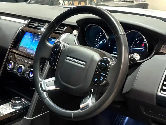 ランドローバー ランドローバー ディスカバリー ランドマークED 道央・札幌 2020(令2)年 3.1万km ユーロンホワイト ユーロンホワイト/ドライバーアシストパック/　・ACC(ステアリングアシスト付)/　・ブラインドスポットアシスト/　・ハイスピードエマージェンシーブレーキ/　・トラフィックサインレゴニクション/　・アダプティブスピードリミッター/2座式3列目シート/フロントシートヒーター/ステアリングヒーター/21インチ”スタイル1012”10スプリットスポークAW/ブラックルーフレール/MERIDIANサウンド/純正メモリナビ/360°カメラ/パークアシスト/パワーテールゲート