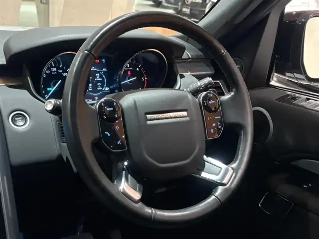 ランドローバー ランドローバー ディスカバリー ランドマークED 道央・札幌 2020(令2)年 3.1万km ユーロンホワイト ユーロンホワイト/ドライバーアシストパック/　・ACC(ステアリングアシスト付)/　・ブラインドスポットアシスト/　・ハイスピードエマージェンシーブレーキ/　・トラフィックサインレゴニクション/　・アダプティブスピードリミッター/2座式3列目シート/フロントシートヒーター/ステアリングヒーター/21インチ”スタイル1012”10スプリットスポークAW/ブラックルーフレール/MERIDIANサウンド/純正メモリナビ/360°カメラ/パークアシスト/パワーテールゲート