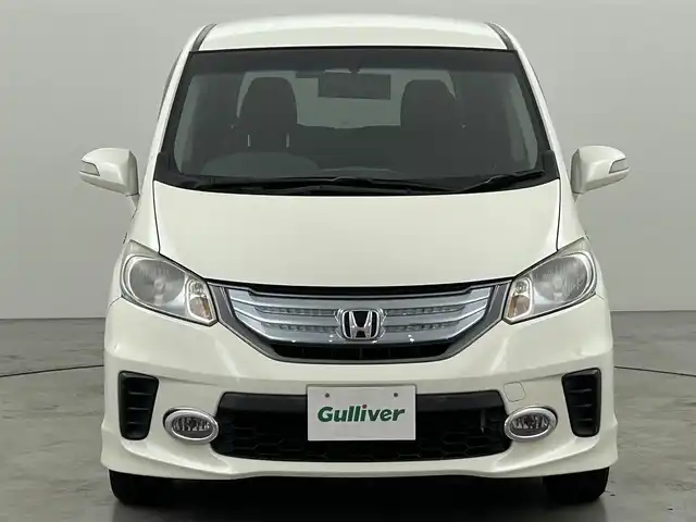 ホンダ フリード ハイブリット ジャストセレクション 福岡県 2013(平25)年 9万km プレミアムホワイトパール 社外パナソニックナビ（ＢＴ，フルセグＴＶ）　/ＥＴＣ　/前後ドライブレコーダー　/クルーズコントロール　/両側電動スライドドア　/横滑り防止装置　/フロントガラス熱線　/電動格納式ドアミラー　/純正１５インチＡＷ