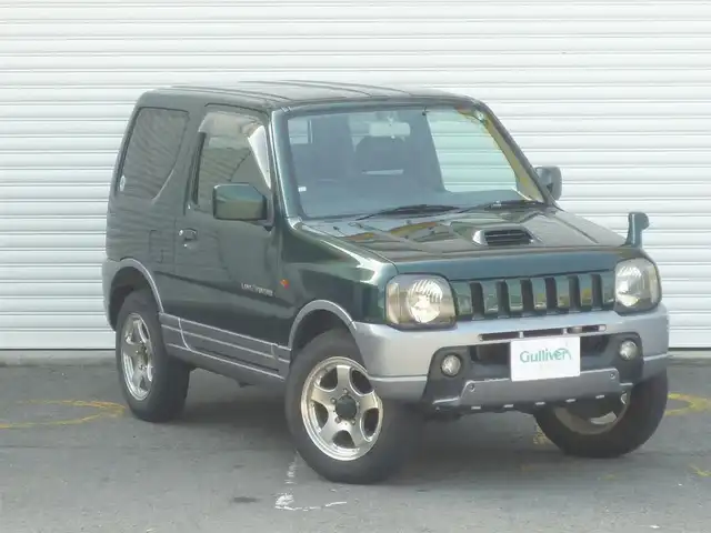 スズキ ジムニー ランドベンチャー 和歌山県 2003(平15)年 9.6万km グローブグリーンパールメタリック Clarion CDデッキ（CX-315）/　BT/CD/iPod/AUX/USB/5速MT/フォグランプ/電動格納ミラー/ドアバイザー/社外ETC/社外１６インチアルミ/取扱説明書/保証書