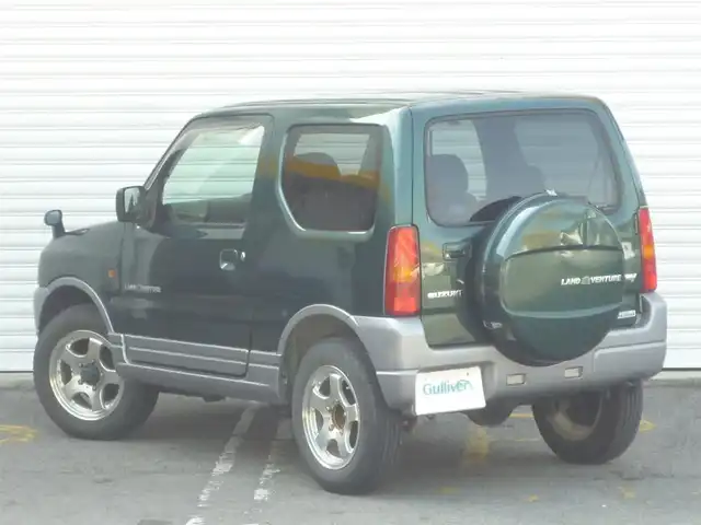スズキ ジムニー ランドベンチャー 和歌山県 2003(平15)年 9.6万km グローブグリーンパールメタリック Clarion CDデッキ（CX-315）/　BT/CD/iPod/AUX/USB/5速MT/フォグランプ/電動格納ミラー/ドアバイザー/社外ETC/社外１６インチアルミ/取扱説明書/保証書
