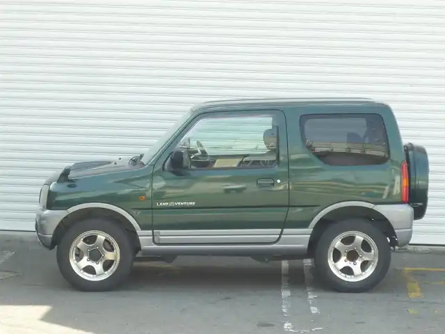 スズキ ジムニー ランドベンチャー 和歌山県 2003(平15)年 9.6万km グローブグリーンパールメタリック Clarion CDデッキ（CX-315）/　BT/CD/iPod/AUX/USB/5速MT/フォグランプ/電動格納ミラー/ドアバイザー/社外ETC/社外１６インチアルミ/取扱説明書/保証書