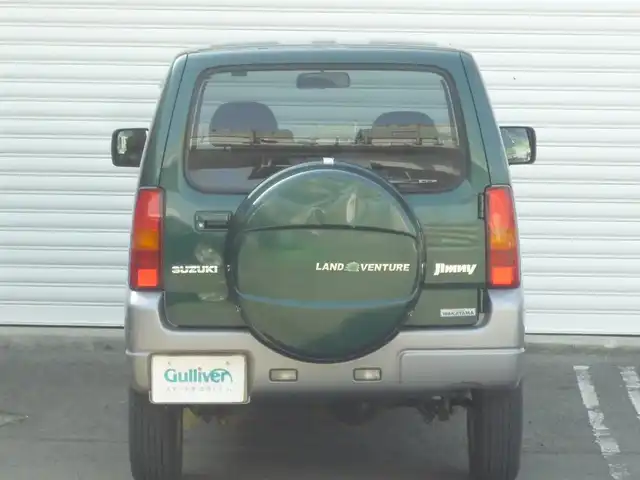 スズキ ジムニー ランドベンチャー 和歌山県 2003(平15)年 9.6万km グローブグリーンパールメタリック Clarion CDデッキ（CX-315）/　BT/CD/iPod/AUX/USB/5速MT/フォグランプ/電動格納ミラー/ドアバイザー/社外ETC/社外１６インチアルミ/取扱説明書/保証書