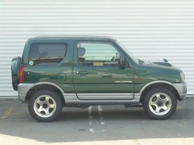 スズキ ジムニー ランドベンチャー 和歌山県 2003(平15)年 9.6万km グローブグリーンパールメタリック Clarion CDデッキ（CX-315）/　BT/CD/iPod/AUX/USB/5速MT/フォグランプ/電動格納ミラー/ドアバイザー/社外ETC/社外１６インチアルミ/取扱説明書/保証書