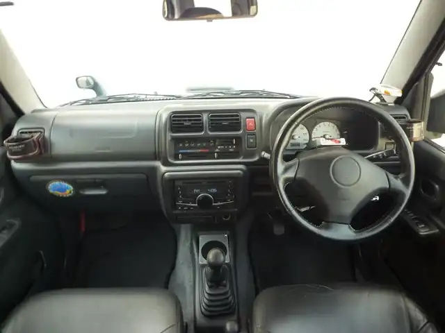 スズキ ジムニー ランドベンチャー 和歌山県 2003(平15)年 9.6万km グローブグリーンパールメタリック Clarion CDデッキ（CX-315）/　BT/CD/iPod/AUX/USB/5速MT/フォグランプ/電動格納ミラー/ドアバイザー/社外ETC/社外１６インチアルミ/取扱説明書/保証書