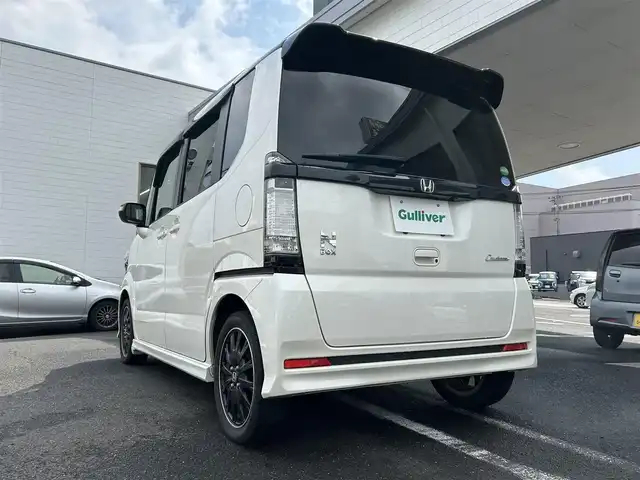 ホンダ Ｎ ＢＯＸ 2トーン カスタム G ターボAパッケージ 長崎県 2014(平26)年 7.7万km プレミアムホワイトパール ナビ取説/純正SDナビ/・AM/FM/・btオーディオ/・CD/DVD/・フルセグTV/バックカメラ/両側パワースライドドア/ステアリングスイッチ/フロアマット/ドアバイザー/CTBA/横滑り防止/パドルシフト/ETC