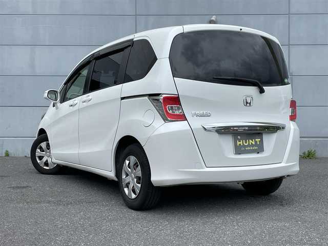 ホンダ フリード G プレミアムエディション 千葉県 2016(平28)年 6.1万km ホワイトオーキッドパール 純正ナビ7インチナビ/バックカメラ/Bluetooth/フルセグTV/両側パワースライドドア/クルーズコントロール/ステアリングリモコン/ETC/オートライト
