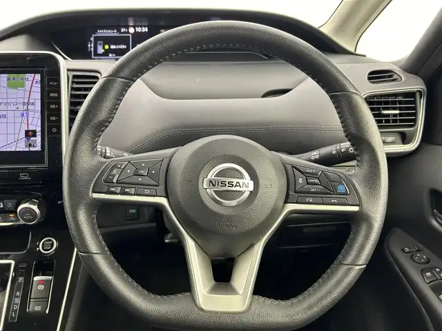 日産 セレナ ハイウェイスター V 愛知県 2022(令4)年 4万km マルーンレッド 2トーン 純正10インチナビ/　　・CD/DVD/フルセグ/BT/アラウンドビューモニター/デジタルインナーミラー/ドライブレコーダー/純正後席11インチフリップダウンモニター/ETC/ステアリングリモコン/プロパイロット/エマージェンシーブレーキ/オートブレーキホールド/後方車両検知機能/後側方衝突防止システム/車線逸脱防止警報機能/両側パワースライドドア/ハンズフリーオートスライド/デュアルバックドア/純正16インチアルミホイール/LEDヘッドライト/フォグランプ/社外AWスタッドレスタイヤセット積み込み/取扱説明書/保証書/スペアキー