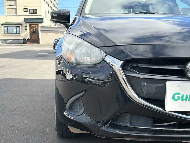 マツダ デミオ 13S 道北・旭川 2018(平30)年 8万km ジェットブラックマイカ /４WD//純正ナビ/CD/DVD//BT/TV/ラジオ//バックカメラ//純正エンジンスターター//i-ACTIVSENSE/スマートシティブレーキサポート/車線逸脱警報/ブラインドスポットモニタリング//オートライト//オートウィンドウ//ステアリングスイッチ//パーキングセンサー//アイドリングストップ//ホイール付き冬タイヤ積込み